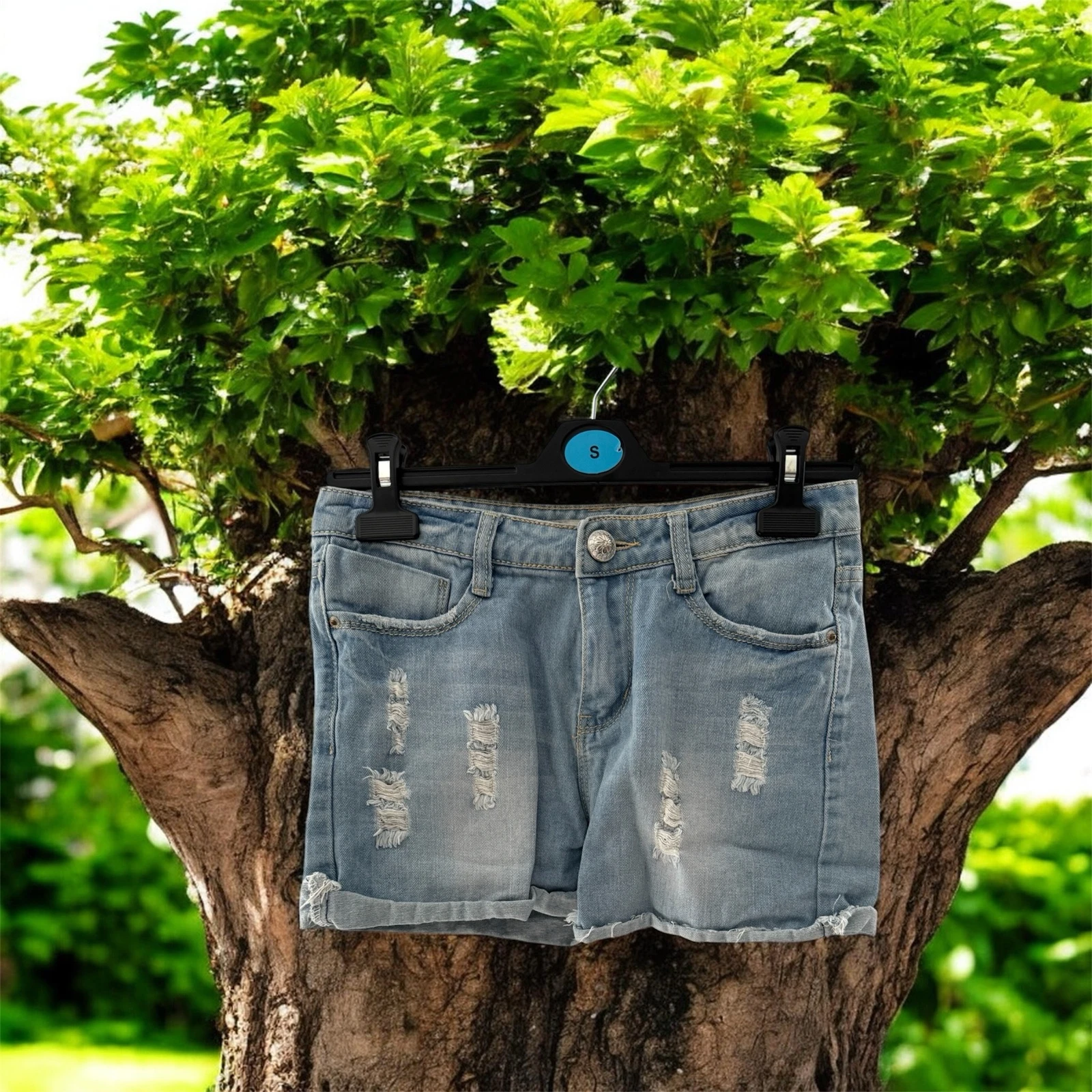 ✨ Short en jean bleu clair destroy – Taille 34 – Très bon état ✨